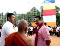 President Rajapaksa viewing huge Buddhist flag.